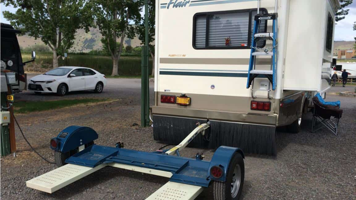 Better to flat-tow dinghy or use tow dolly?