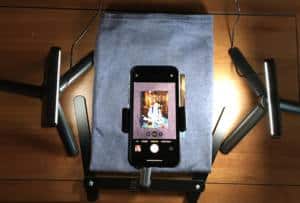 A phone camera is taking a photo of a printed photo, this is how to digitize photos.