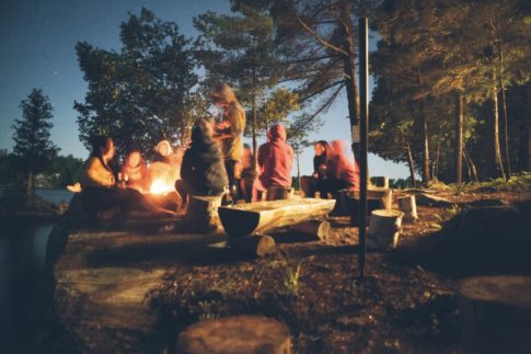 A group of friends sitting around the campfire discuss the downsides to workamping