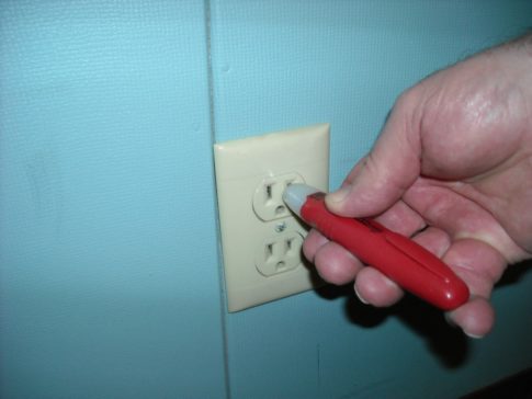 Check an RV outlet with a non-contact voltage tester