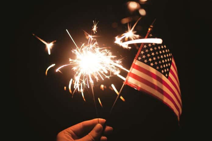 a flag and a sparkler show 4th of July specials