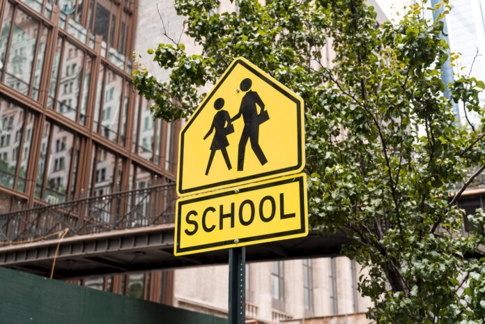 a school crossing sign for this article about school trivia