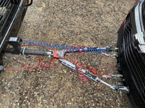 The flat-tow installation on Nanci's new red Chevy Blaze behind her motorhome