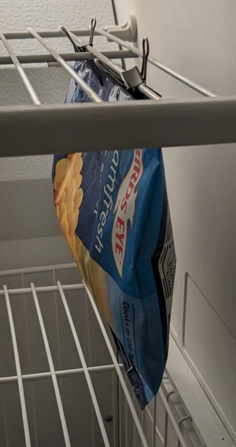 binder clips can hang frozen food in RV freezer