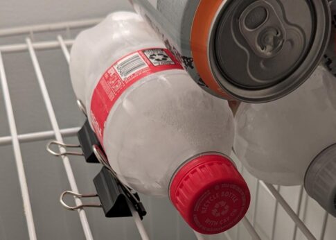 binder clips keep fridge items in place while RVing