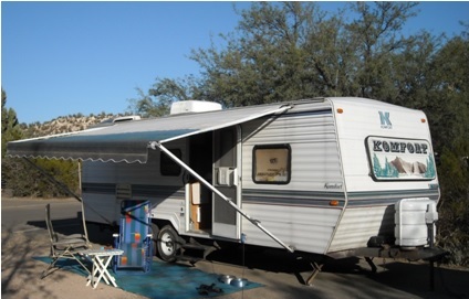 Travel trailer with lounge chairs