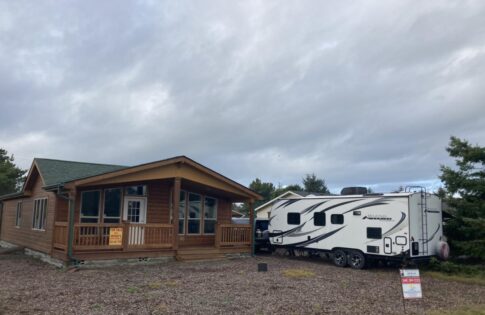 RV next to manufactured home