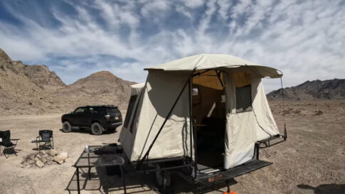 The Jumping Jack tent trailer deployed with the optional portable table