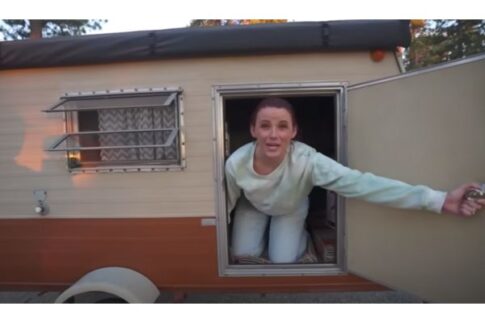 Hobbit sized door on a vintage 1983 Ashford travel trailer
