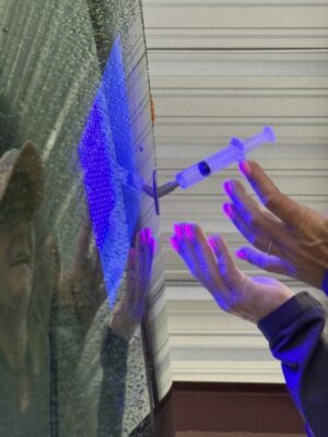 Using UV light and resin for RV windshield repair
