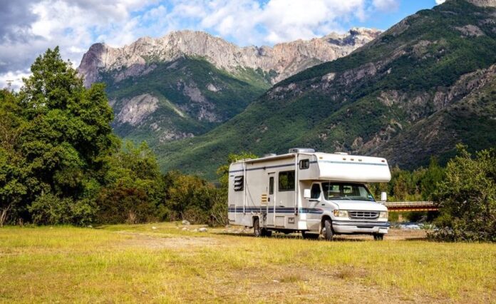 motorhome camped in meadow