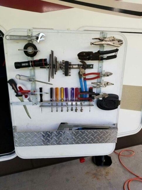 tool storage on RV basement door seen on pinterest