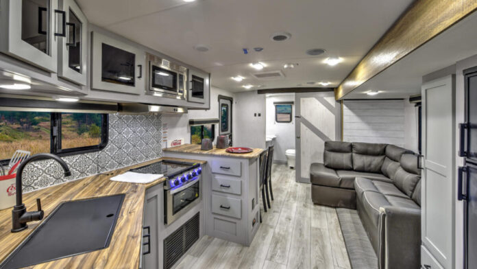 The kitchen in the Heartland North Trail 25RBP