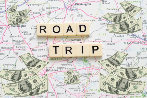 maps and road trip sign, part of how to save money on a road trip