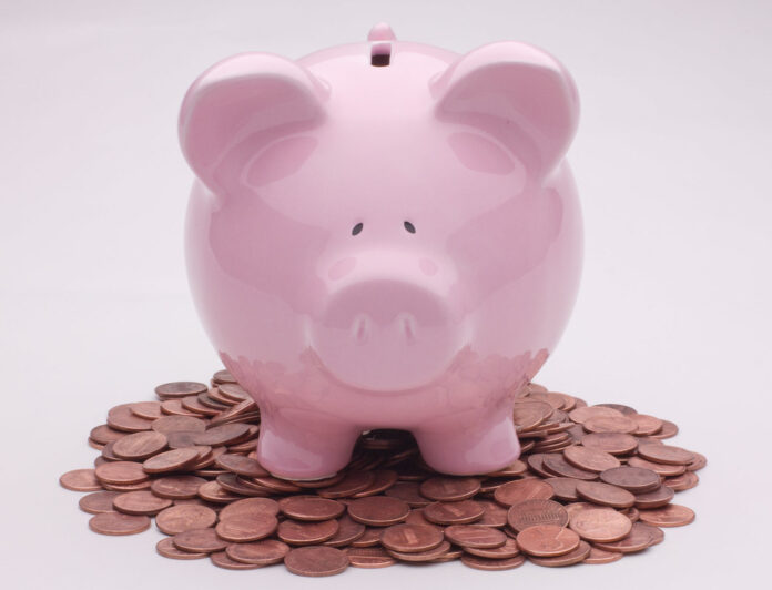 Piggy bank with pennies Photo: flickr