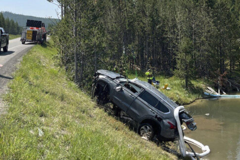 photo by NPS submerged SUV removed from geyser in Yellowstone NP