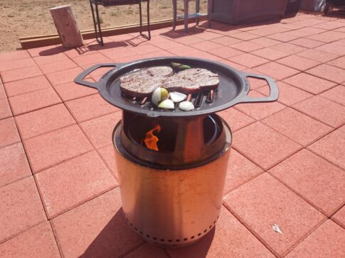 steak and veggis cooking on a Solo stove for Grilled Salsa and Mexican meal prep