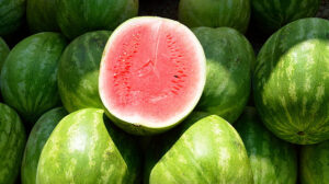 A perfectly ripe cut open watermelon in an article about the health benefits of watermelon.