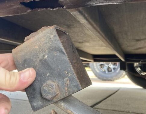 A broken leaf spring hanger