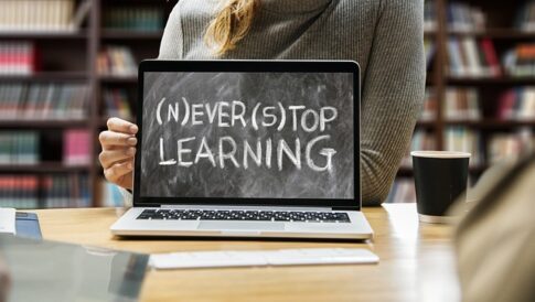 computer screen that reads "never stop learning" for senior learning