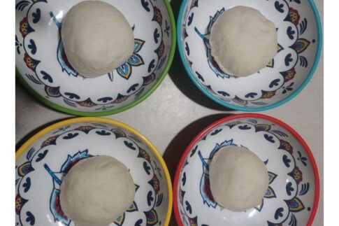 Cheri's Neapolitan pizza dough after dividing into portions