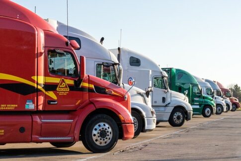 Parked semis at truck stop Pixabay image