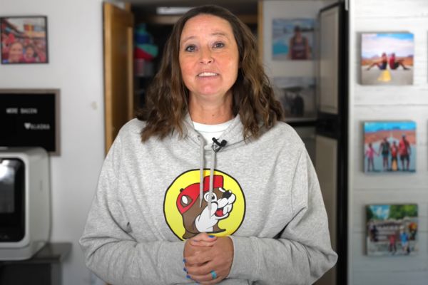 woman in a Buc-ee's travel stop shirt