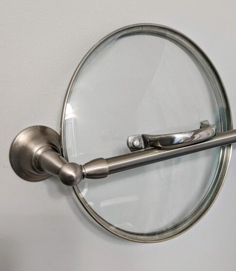 Pan lid stored on towel rack Photo by Gail Marsh