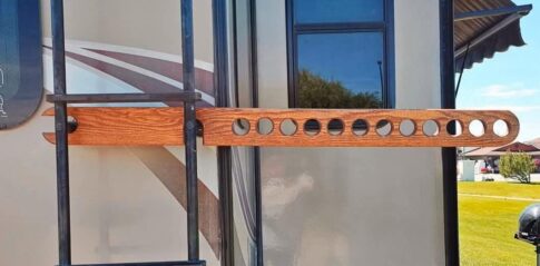 wooden DIY clothes hanger attaches to RV ladder Image: Facebook screenshot