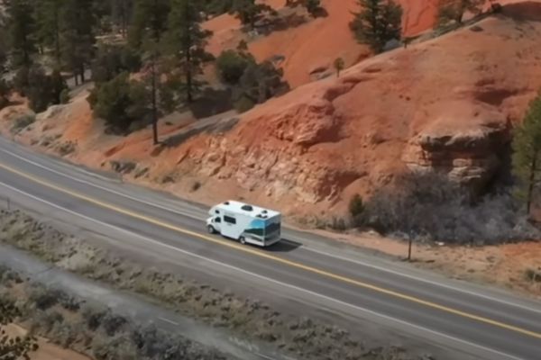 Strange camping laws post title image - RV going down the road