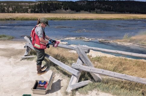 Installing a danger sign at Yellowstone