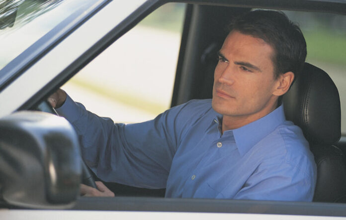 male driver wearing blue shirt Image: FreeImages