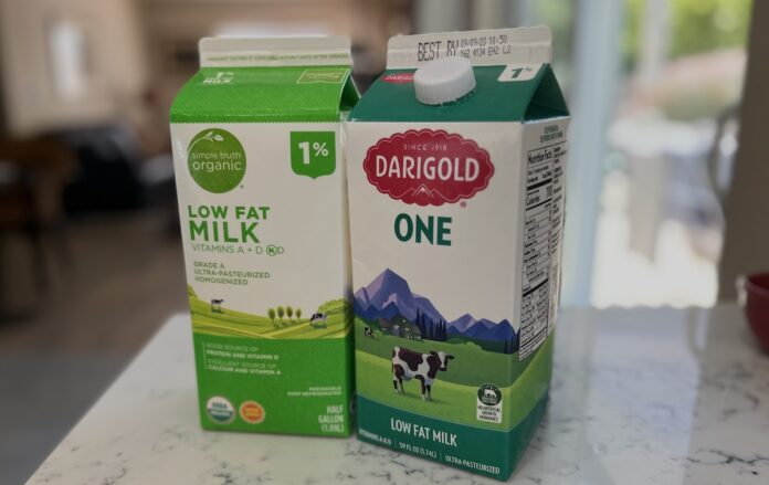 Two half-gallon cartons of milk