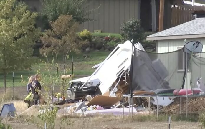 Destroyed RV after dump truck slams it
