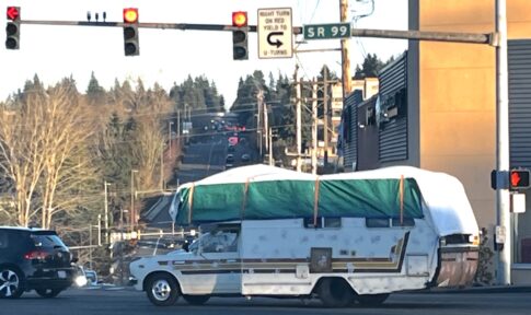 Motorhome with tarp on roof