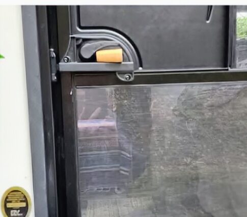 cork in screen door to prevent opening FB; no name given