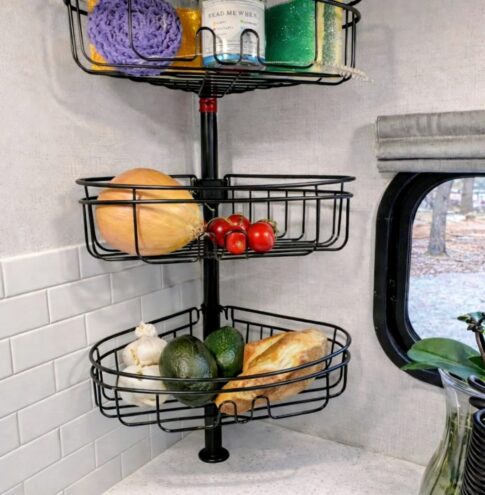 corner storage with shower shelf FB Janetma Haller image