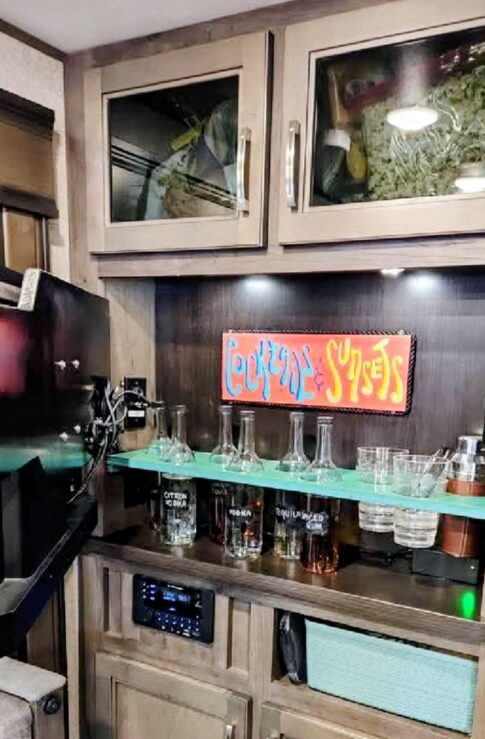 hidden storage behind TV for wine bar facebook image by Missy Sumski DeMauro