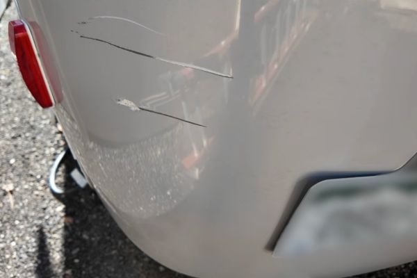 How to fix fiberglass trailer body damage