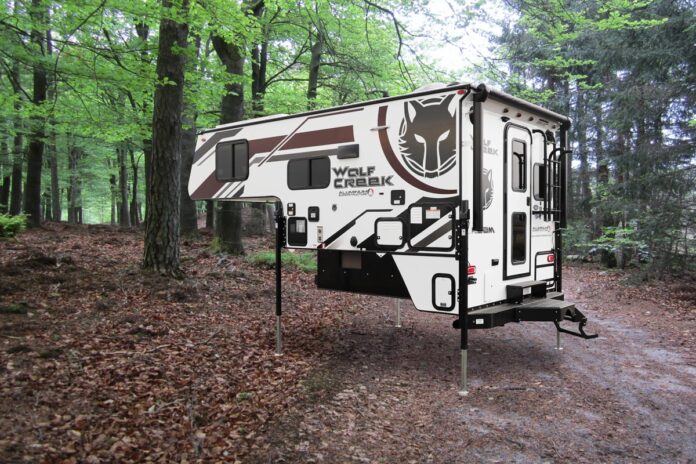 2026 Wolf Creek 850 review with specs, layout details, storage, bath, bedroom, and a clear take on this rugged non-slide truck camper.