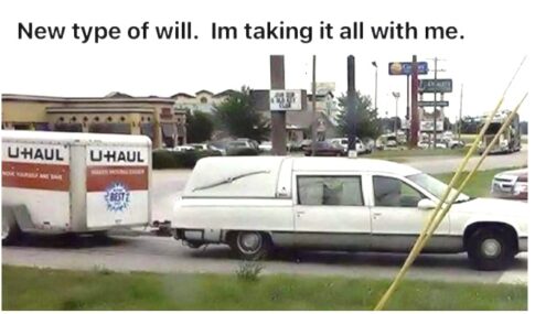 Hearse with U-Haul trailer