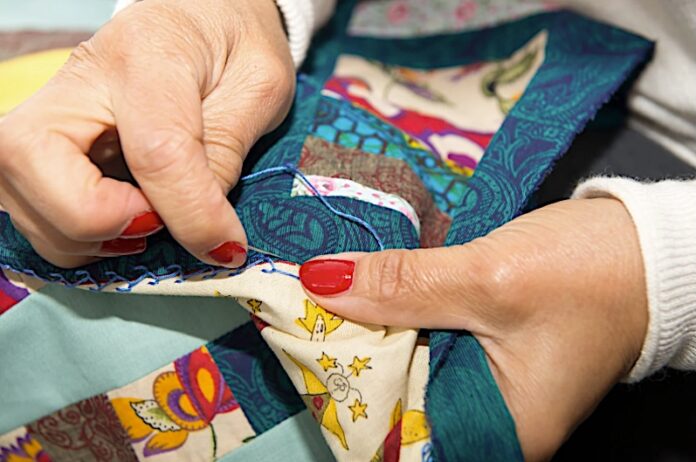 Woman quilting